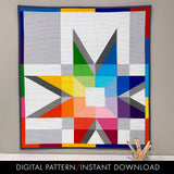 Stellar Translucence quilt hanging on a wall with a jar of colored pencils in front