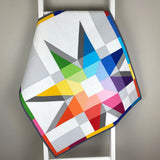 Stellar Translucence quilt on a ladder